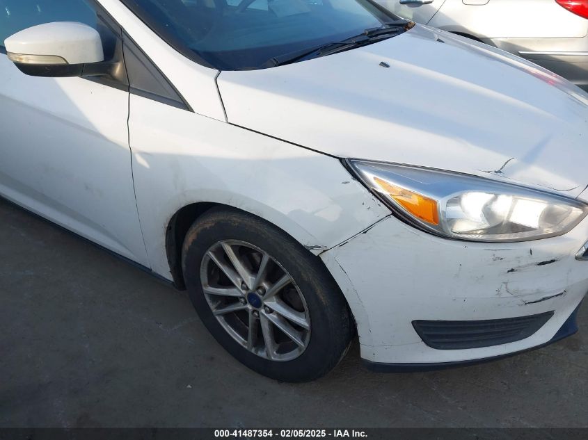 2015 Ford Focus Se VIN: 1FADP3F21FL276336 Lot: 41487354