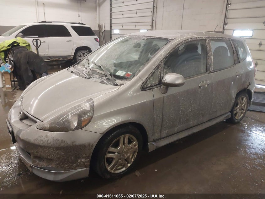 2007 HONDA FIT VIN: JHMGD38657S000389