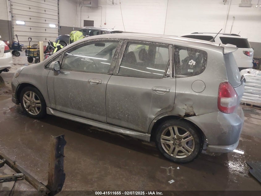 2007 HONDA FIT VIN: JHMGD38657S000389
