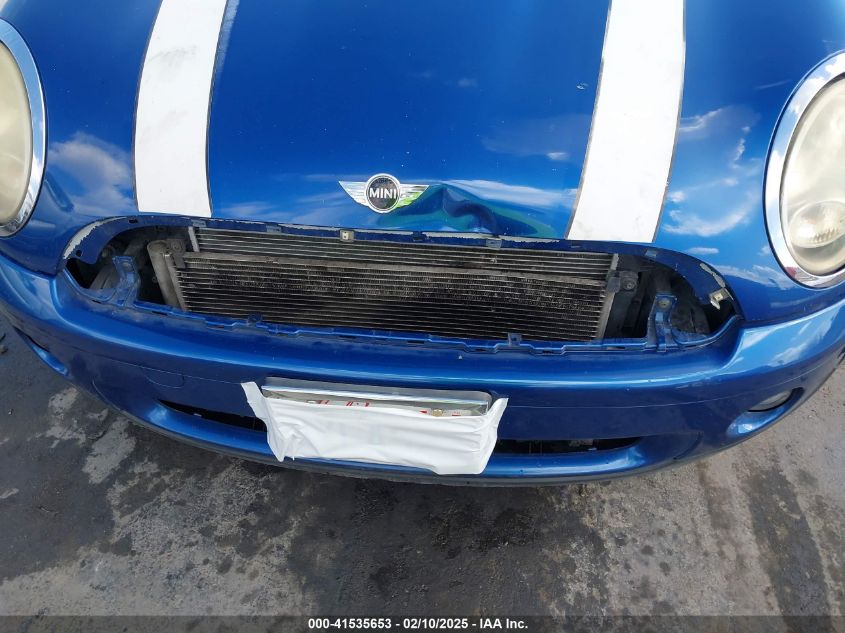 2009 Mini Cooper VIN: WMWMF335X9TW7120 Lot: 41535653