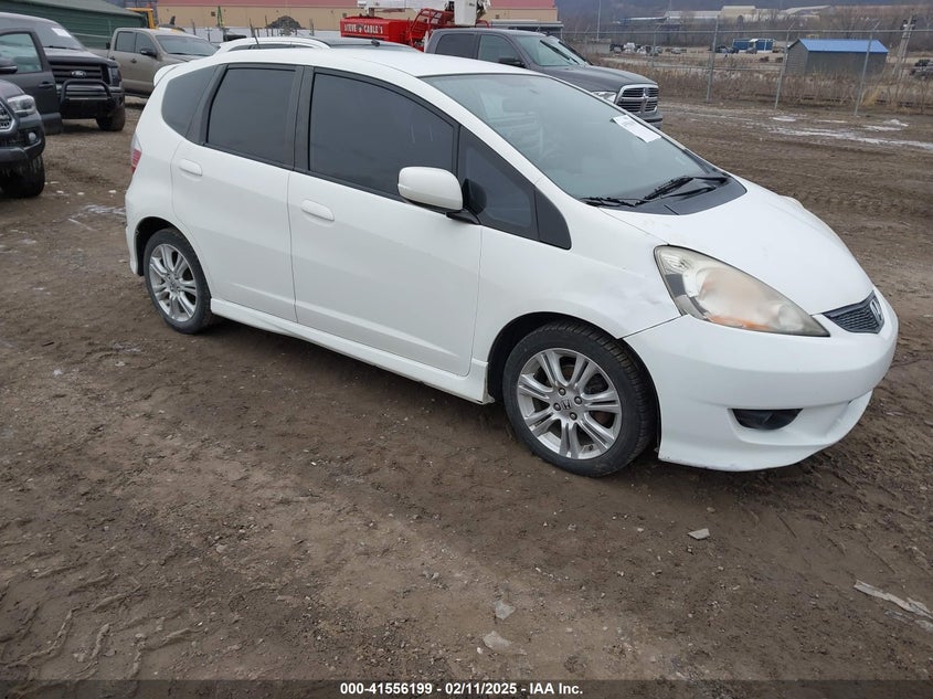 2009 HONDA FIT VIN: JHMGE88459S026843