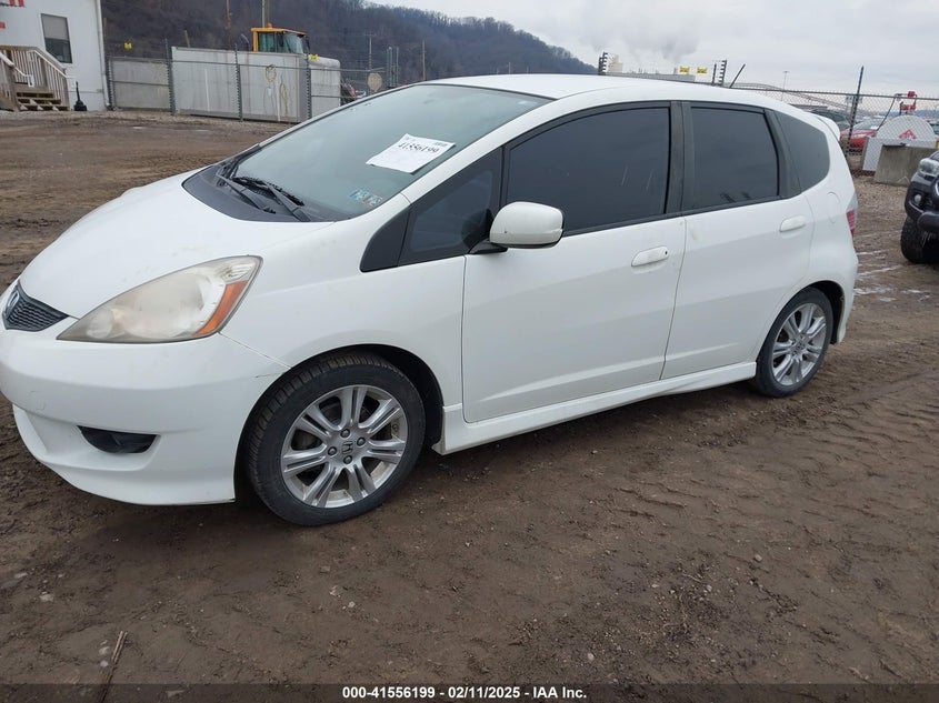 2009 HONDA FIT VIN: JHMGE88459S026843