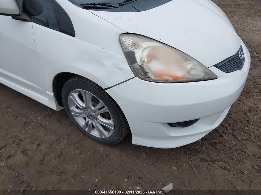 2009 HONDA FIT VIN: JHMGE88459S026843