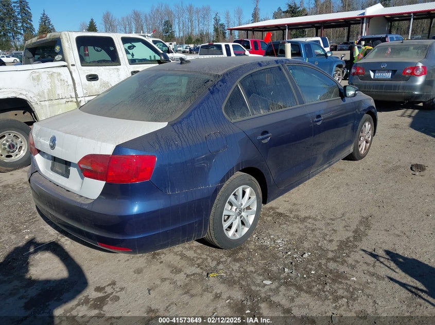 2011 VOLKSWAGEN JETTA VIN: 3VWDX7AJ3BM321590