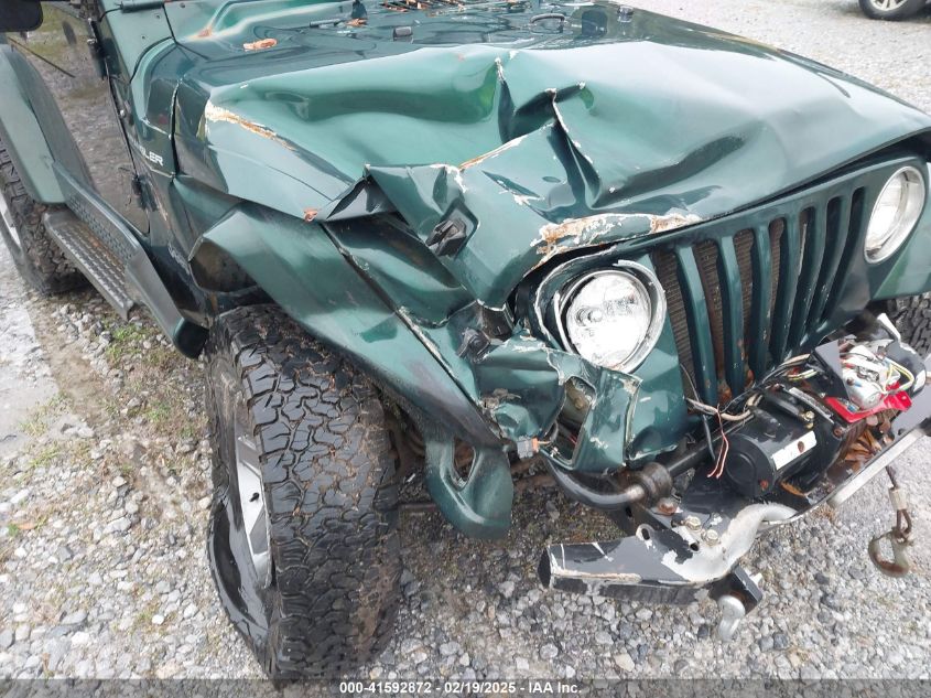 2000 Jeep Wrangler Sahara VIN: 1J4FA59SXYP701098 Lot: 41592872