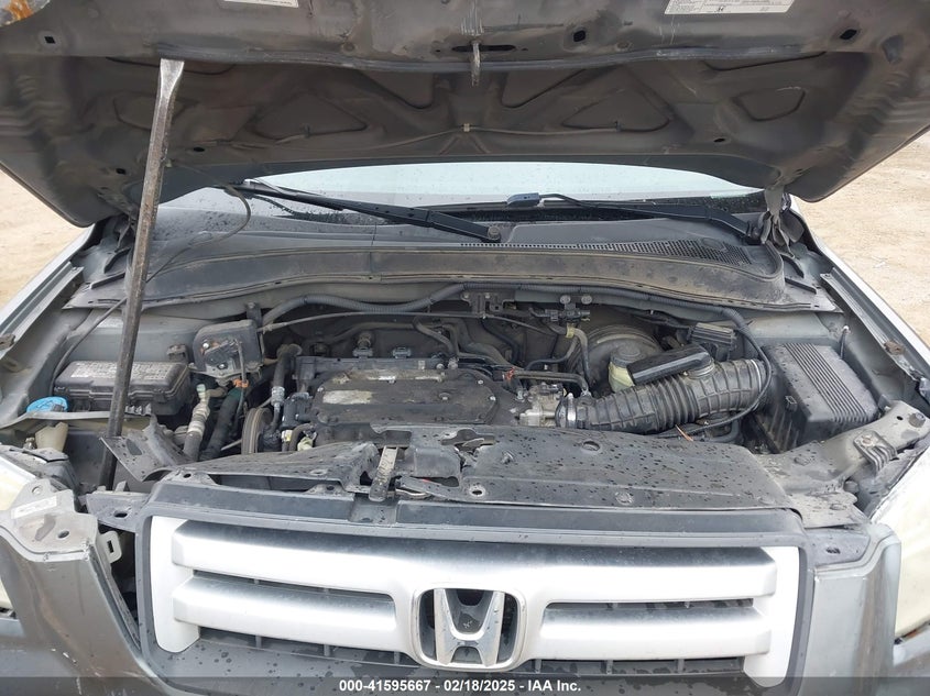 2007 Honda Pilot Lx VIN: 5FNYF281X7B006877 Lot: 41595667