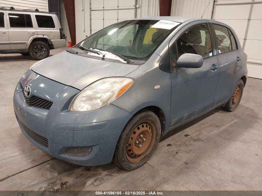 2009 TOYOTA YARIS VIN: JTDKT903395222143