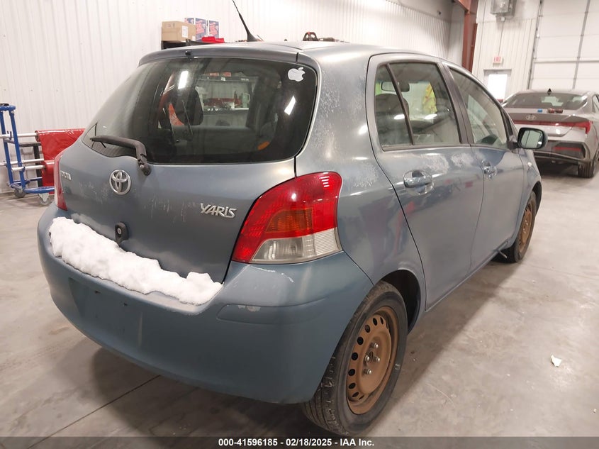 2009 TOYOTA YARIS VIN: JTDKT903395222143