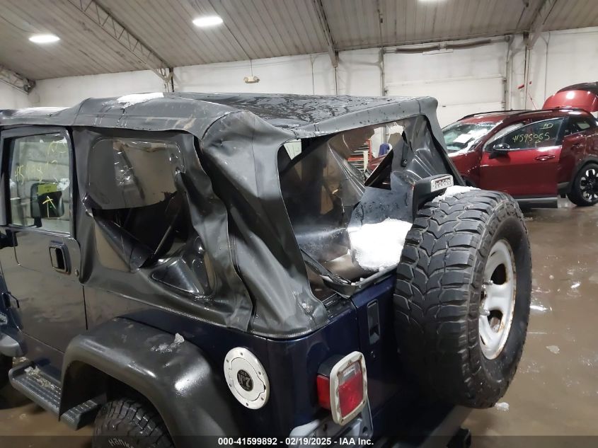 2002 Jeep Wrangler Sport VIN: 1J4FA49S42P762707 Lot: 41599892