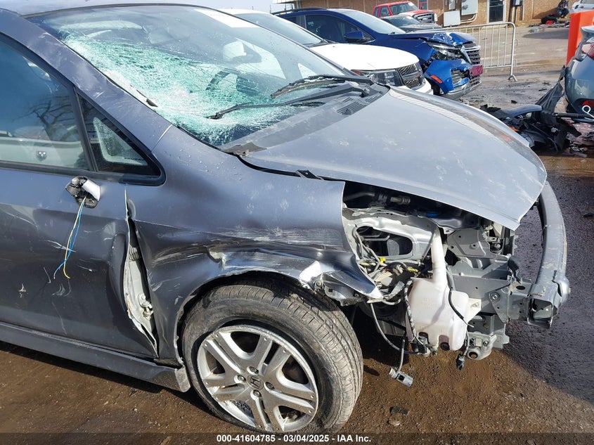 2007 HONDA FIT VIN: JHMGD37647S002930