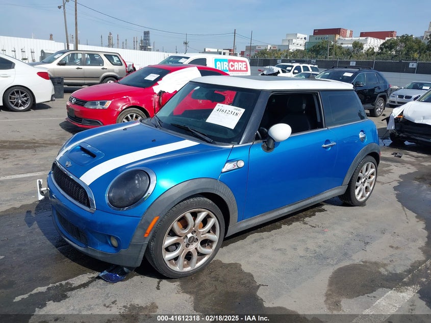 2009 MINI COOPER S VIN: WMWMF73599TW87617