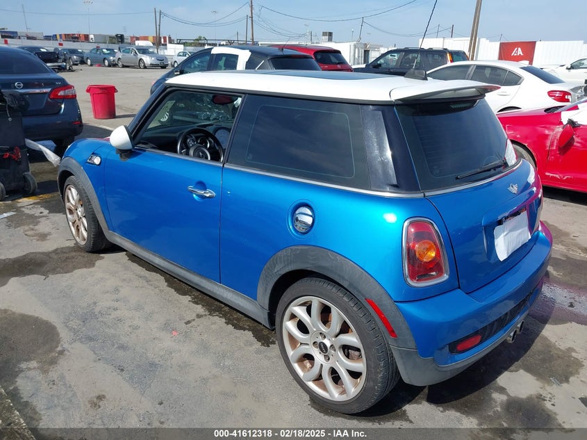 2009 MINI COOPER S VIN: WMWMF73599TW87617