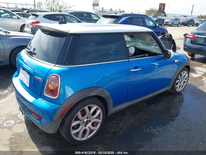2009 MINI COOPER S VIN: WMWMF73599TW87617