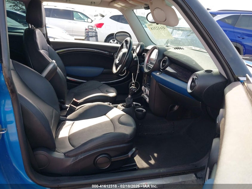2009 MINI COOPER S VIN: WMWMF73599TW87617