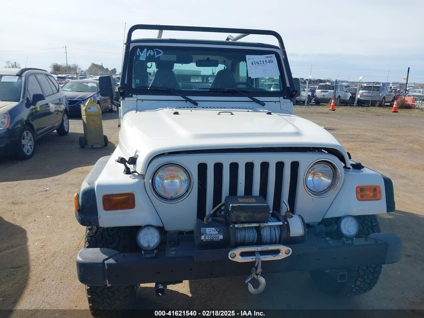 1997 Jeep Wrangler Sport VIN: 1J4FY19S8VP499734 Lot: 41621540