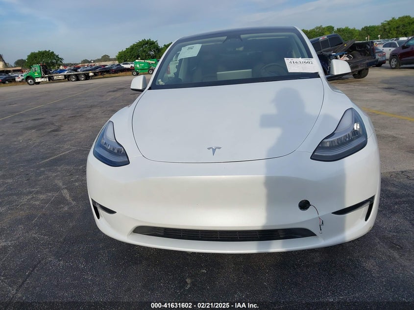2023 Tesla Model Y Awd/Long Range Dual Motor All-Wheel Drive VIN: 7SAYGDEE3PA123054 Lot: 41631602