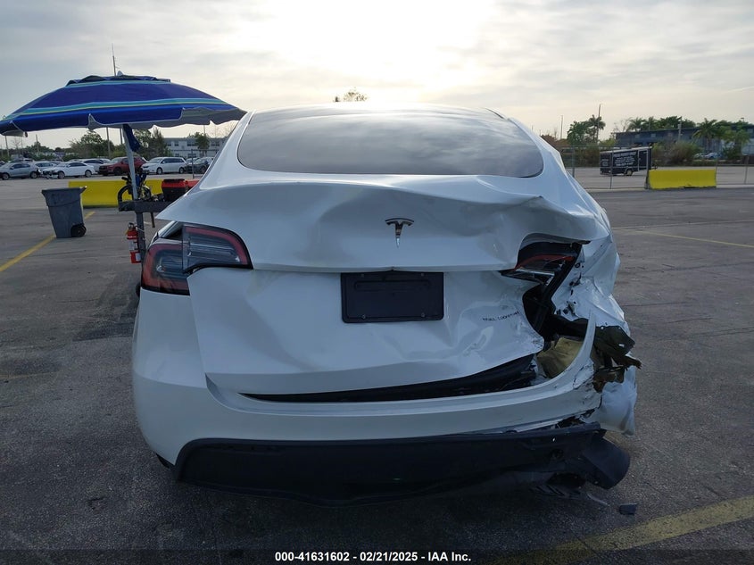 2023 Tesla Model Y Awd/Long Range Dual Motor All-Wheel Drive VIN: 7SAYGDEE3PA123054 Lot: 41631602