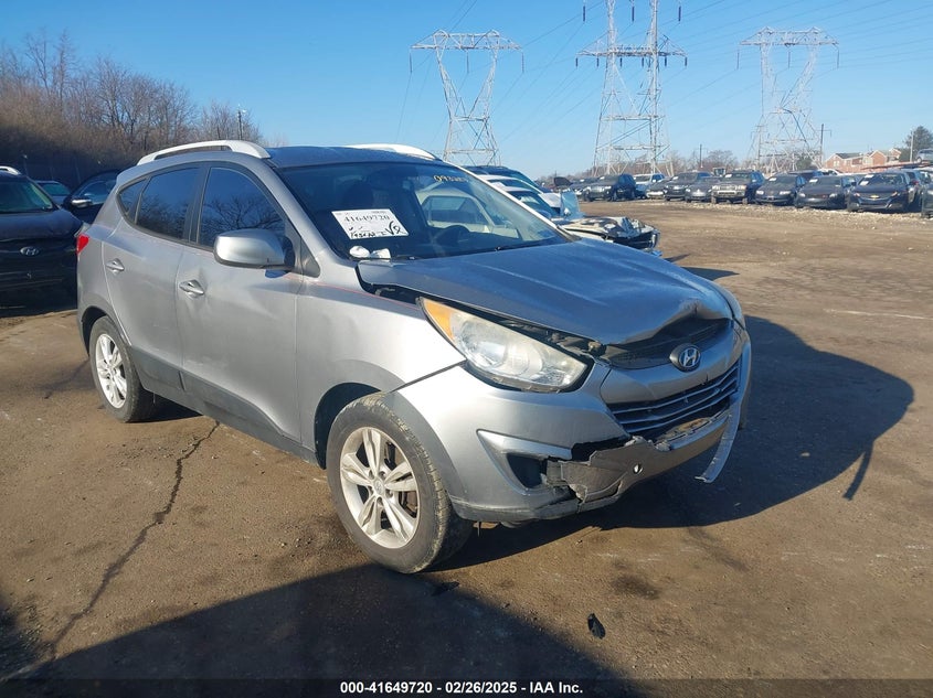 2010 HYUNDAI TUCSON VIN: KM8JUCAC2AU093287