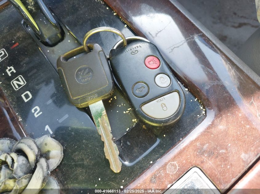 1999 Infiniti Q45 Touring VIN: JNKBY31A8XM603290 Lot: 41668113