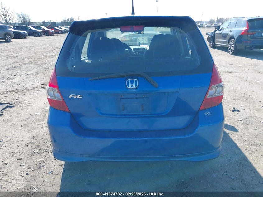2007 HONDA FIT VIN: JHMGD38637S049641