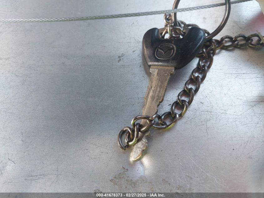 1999 Mazda 626 Es/Lx VIN: 1YVGF22C4X5841892 Lot: 41678373