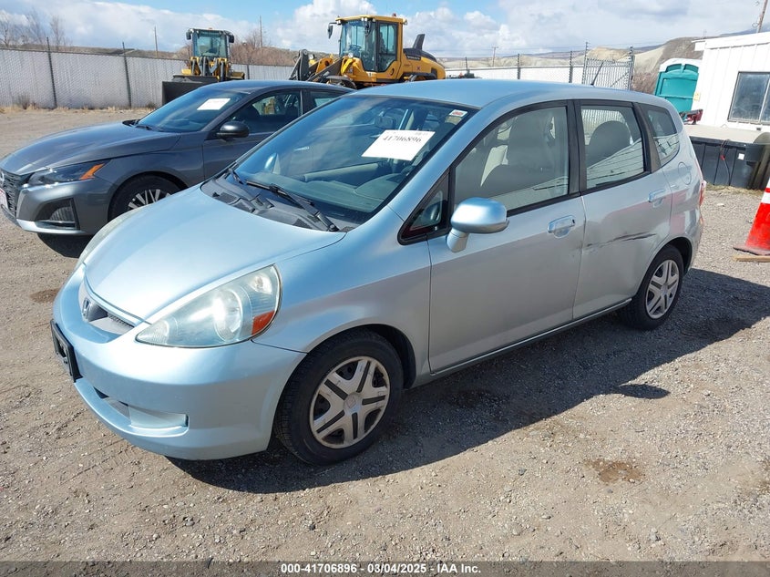 2007 HONDA FIT VIN: JHMGD38417S026289