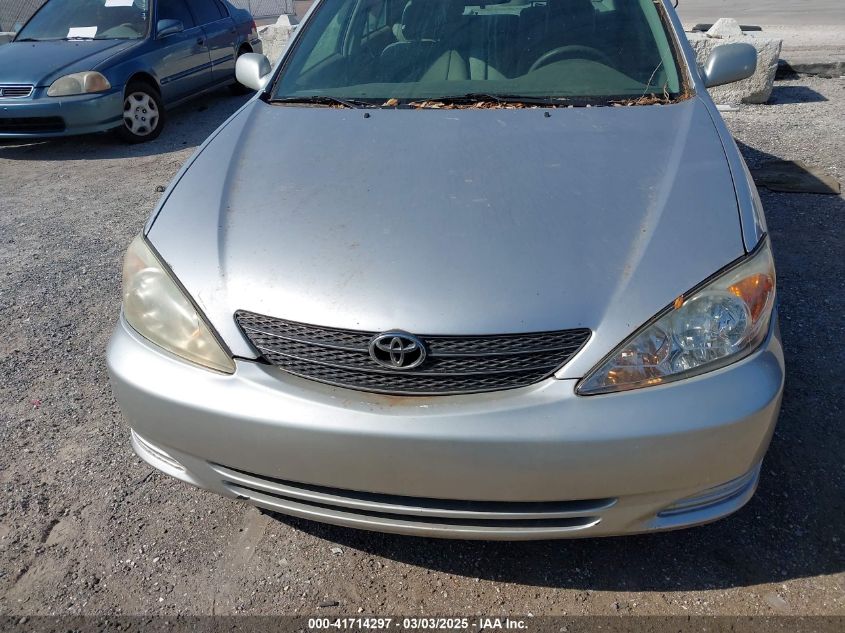 2003 Toyota Camry Le V6 VIN: 4T1BF32KX3U563279 Lot: 41714297