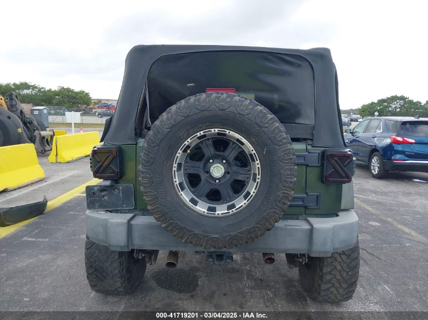 2007 Jeep Wrangler Unlimited Sahara VIN: 1J4GB59177L165421 Lot: 41719201