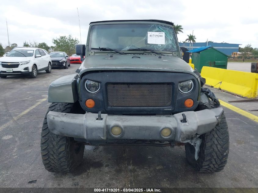 2007 Jeep Wrangler Unlimited Sahara VIN: 1J4GB59177L165421 Lot: 41719201