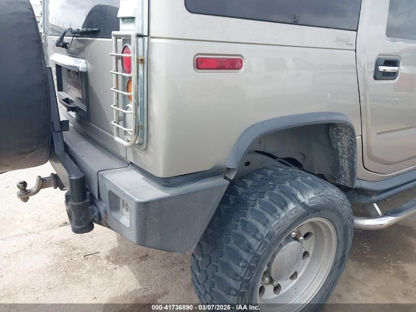 2003 Hummer H2 VIN: 5GRGN23U23H115584 Lot: 41736890