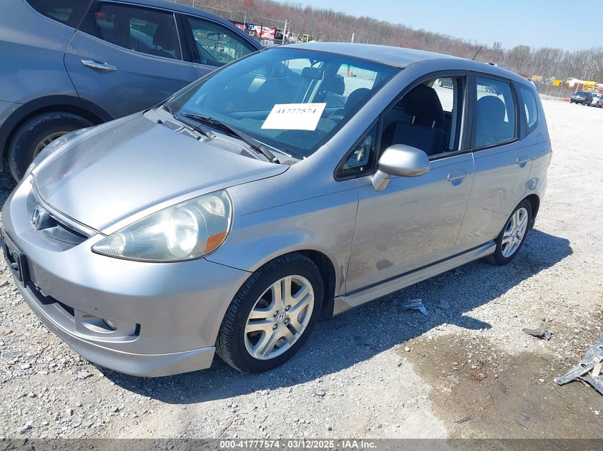 2007 HONDA FIT VIN: JHMGD386X7S057137