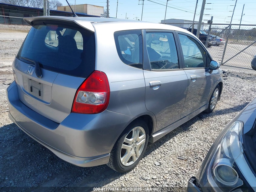 2007 HONDA FIT VIN: JHMGD386X7S057137