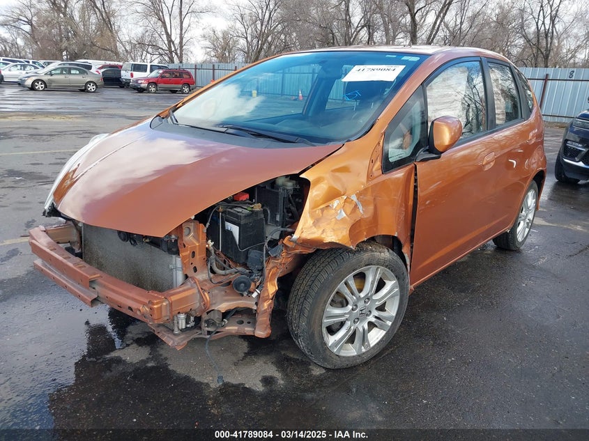 2009 HONDA FIT VIN: JHMGE884X9S074533