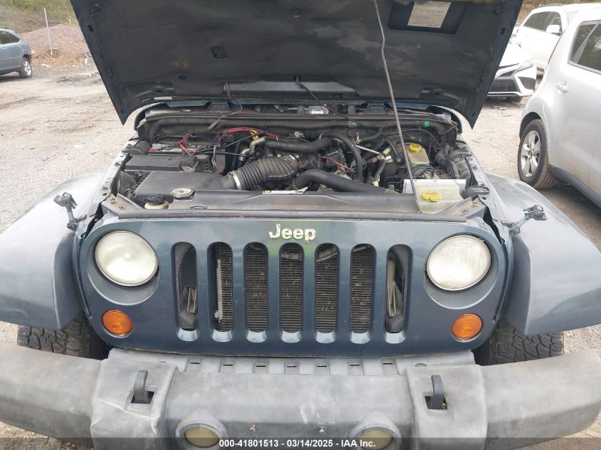 2007 Jeep Wrangler Unlimited Sahara VIN: 1J4GB59197L200251 Lot: 41801513