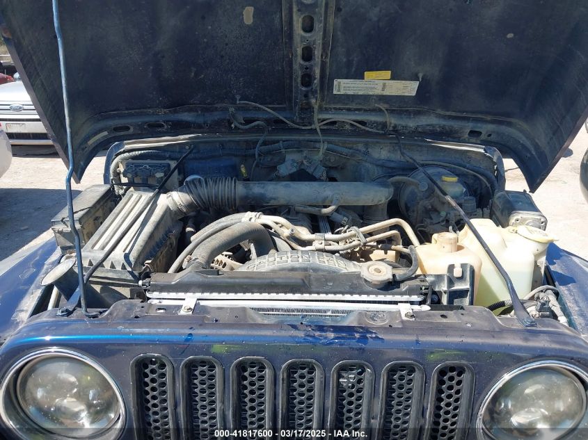 2000 Jeep Wrangler Sport VIN: 1J4FA49S0YP770943 Lot: 41817600