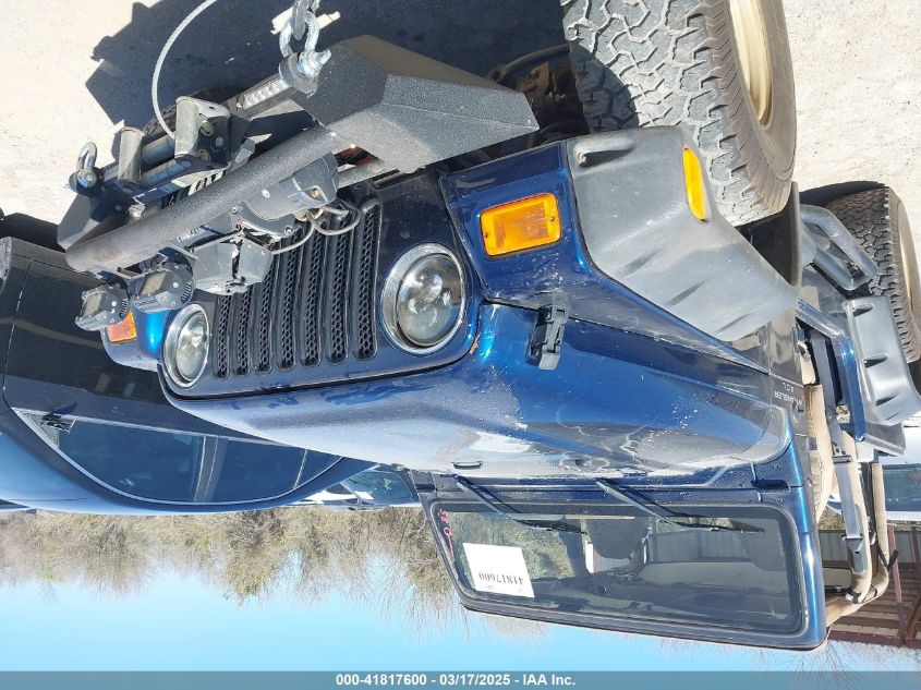 2000 Jeep Wrangler Sport VIN: 1J4FA49S0YP770943 Lot: 41817600