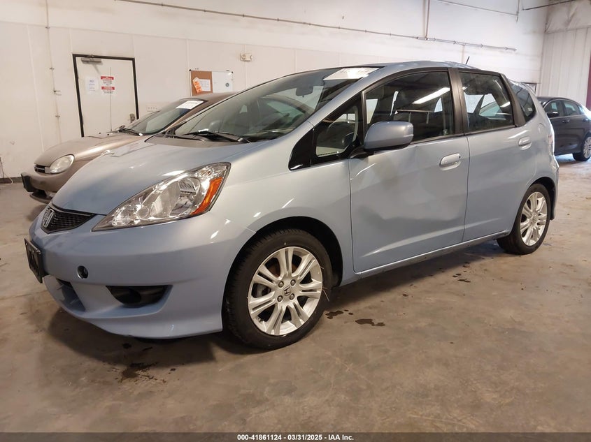 2009 HONDA FIT VIN: JHMGE88489S005033