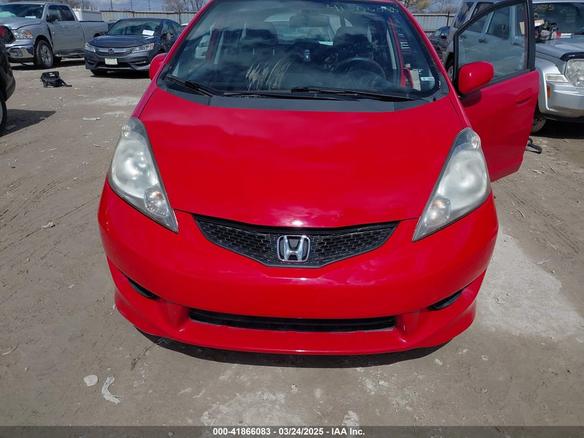 2009 HONDA FIT VIN: JHMGE884X9S004773