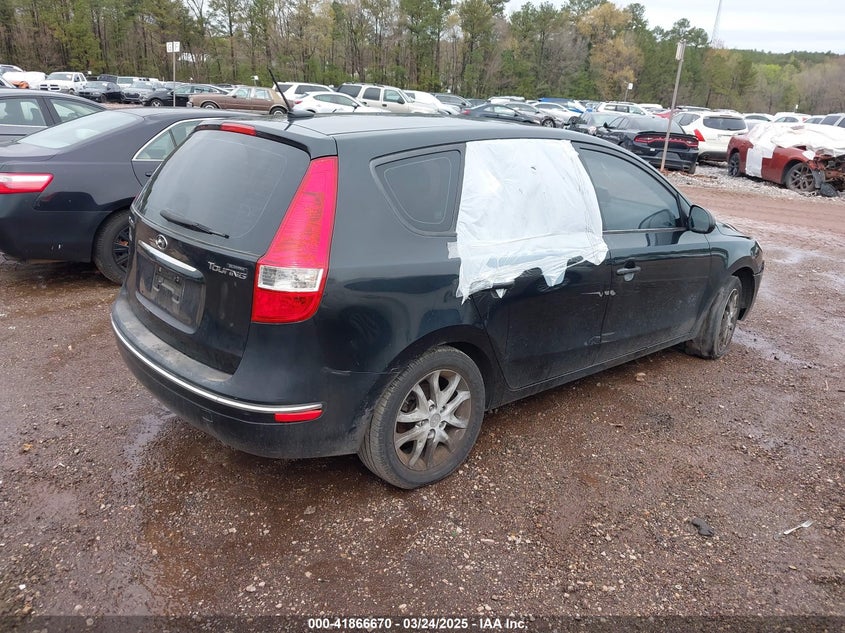 2009 HYUNDAI ELANTRA TOURING VIN: KMHDC86E99U039276
