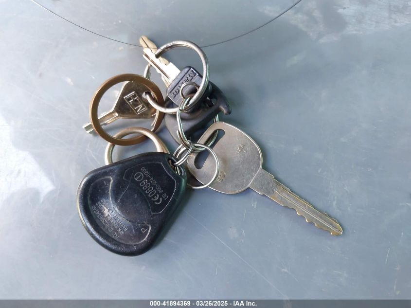 2004 Chevrolet Tahoe Lt VIN: 1GNEC13ZX4J300875 Lot: 41894369