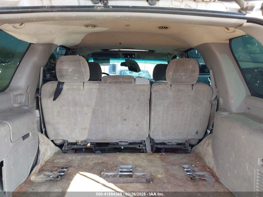 2004 Chevrolet Tahoe Lt VIN: 1GNEC13ZX4J300875 Lot: 41894369