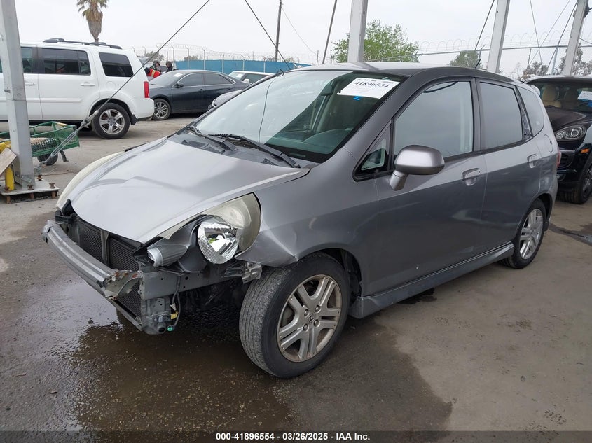 2007 HONDA FIT VIN: JHMGD38687S037601