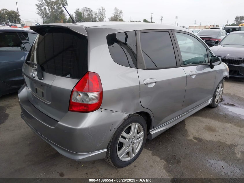 2007 HONDA FIT VIN: JHMGD38687S037601