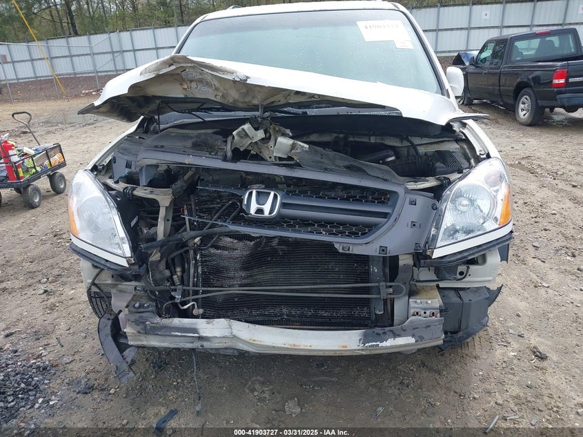 2004 Honda Pilot Ex-L VIN: 2HKYF18504H509604 Lot: 41903727