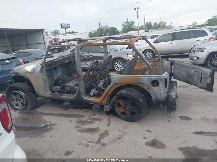 2010 Jeep Wrangler Unlimited Sahara VIN: 1J4HA5H13AL103417 Lot: 41904338