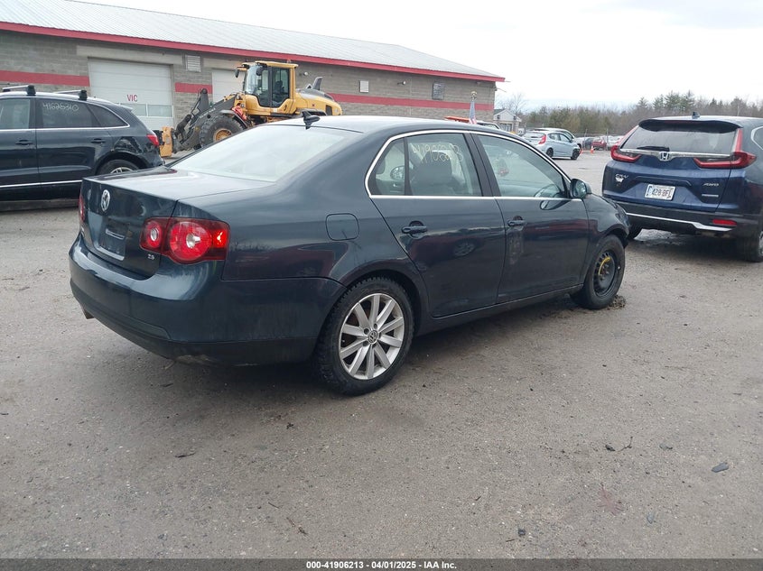 2009 VOLKSWAGEN JETTA VIN: 3VWRZ71K79M062217