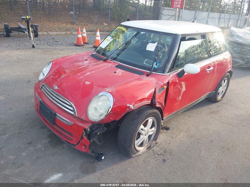 2006 MINI COOPER VIN: WMWRC33516TJ77300