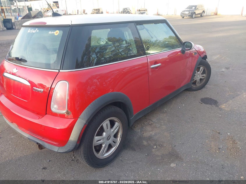 2006 MINI COOPER VIN: WMWRC33516TJ77300