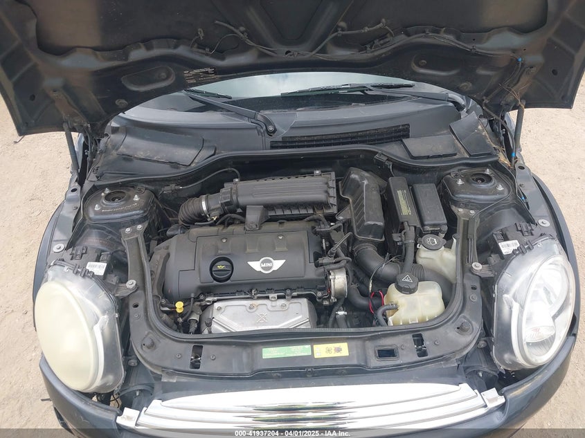 2009 MINI COOPER VIN: WMWMF33559TU70378