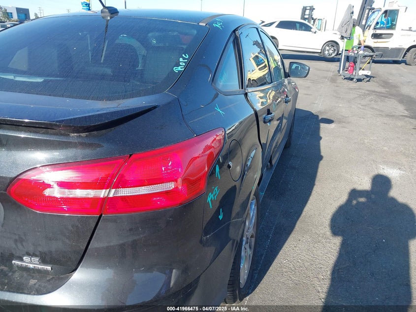 2015 FORD FOCUS VIN: 1FADP3F22FL306055